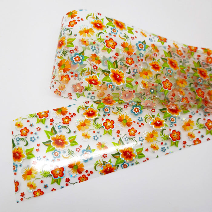Floral-patterned nail foil with colourful flowers on a white background