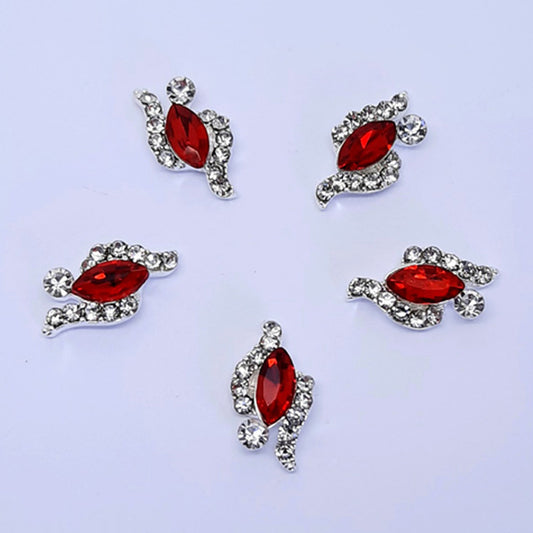 Marquise Crystals Nail Charms, Red x 4. Beautiful nail charms with a large red crystal set into silver metal, embedded with small clear gems. Flat backed. Other colours also available.