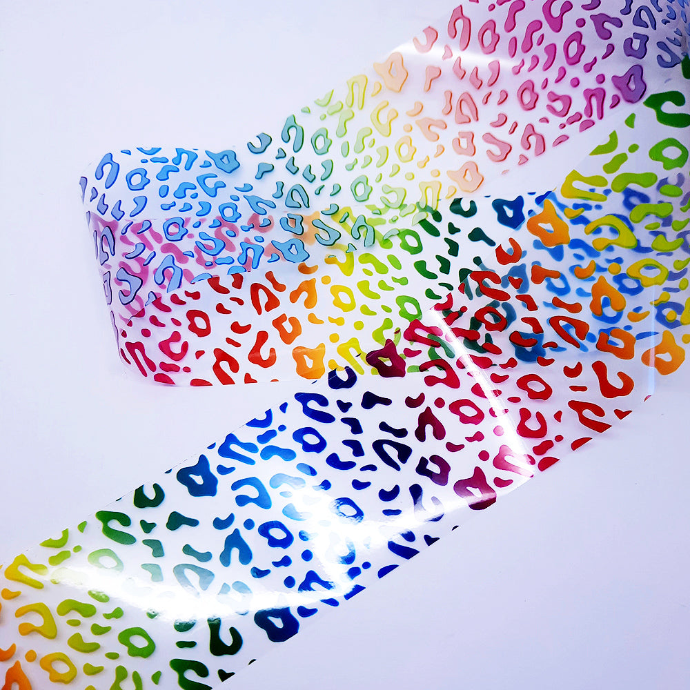 Colourful leopard print patterned nail art foil on a white background