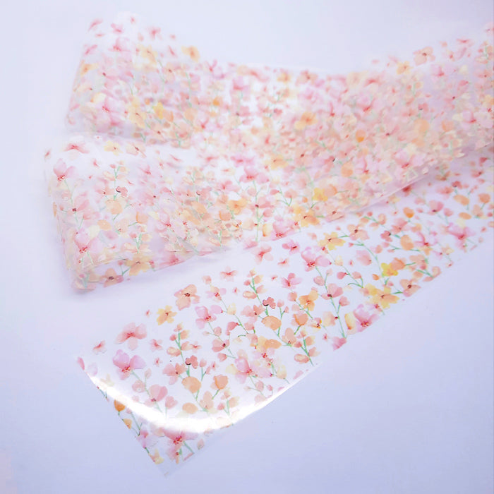 Nail foil with floral design on a light background