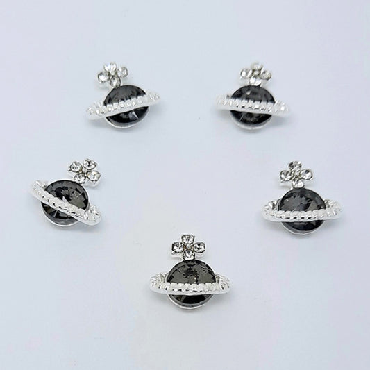 Planet Orb Nail Charms x 4, Black. Beautiul large black gem set into silver metal, with some added clear gems. Other colours also available.