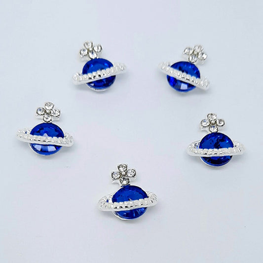 Planet Orb Nail Charms x 4, Blue. Beautiul large blue gem set into silver metal, with some added clear gems. Other colours also available.