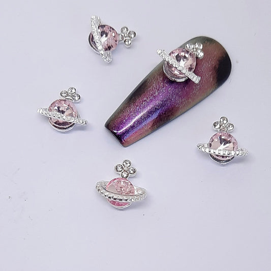 Planet Orb Nail Charms x 4, Light Pink. Beautiul large soft pink gem set into silver metal, with some added clear gems. Other colours also available.