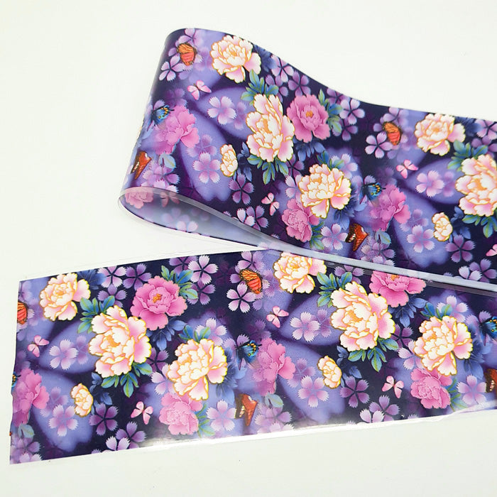 Floral-patterned nail foil on a white background