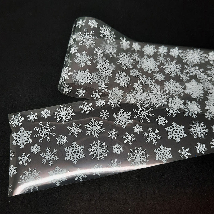 Feuilles pour ongles de Noël, flocons de neige blancs sur transparent