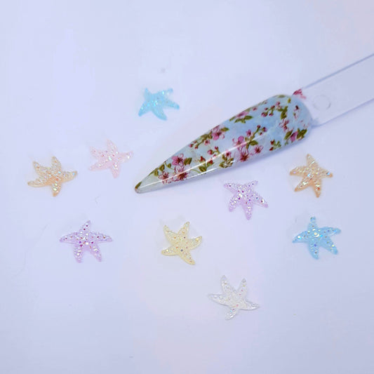 Sparkly Aurora Starfish Nail Decoration x 6. These are so adorable, soft and sparkly colours. I love them so much. Include them in all your summer nail designs.