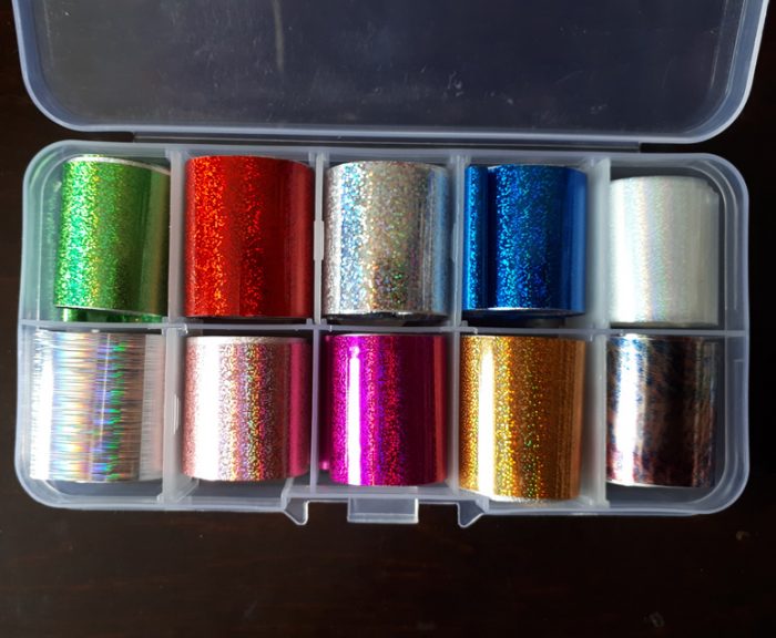 A set of 10 sparkly, colourful nail foils