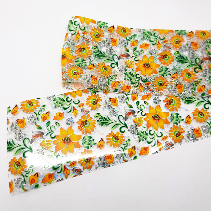 Floral patterned nail foil with orange and green flowers on a white background